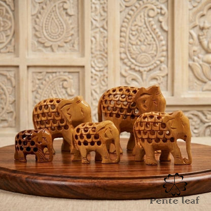 The Bodhi Quintet : Hand-carved Wooden Mini Elephant Family (trunk down) | Wooden Handicraft