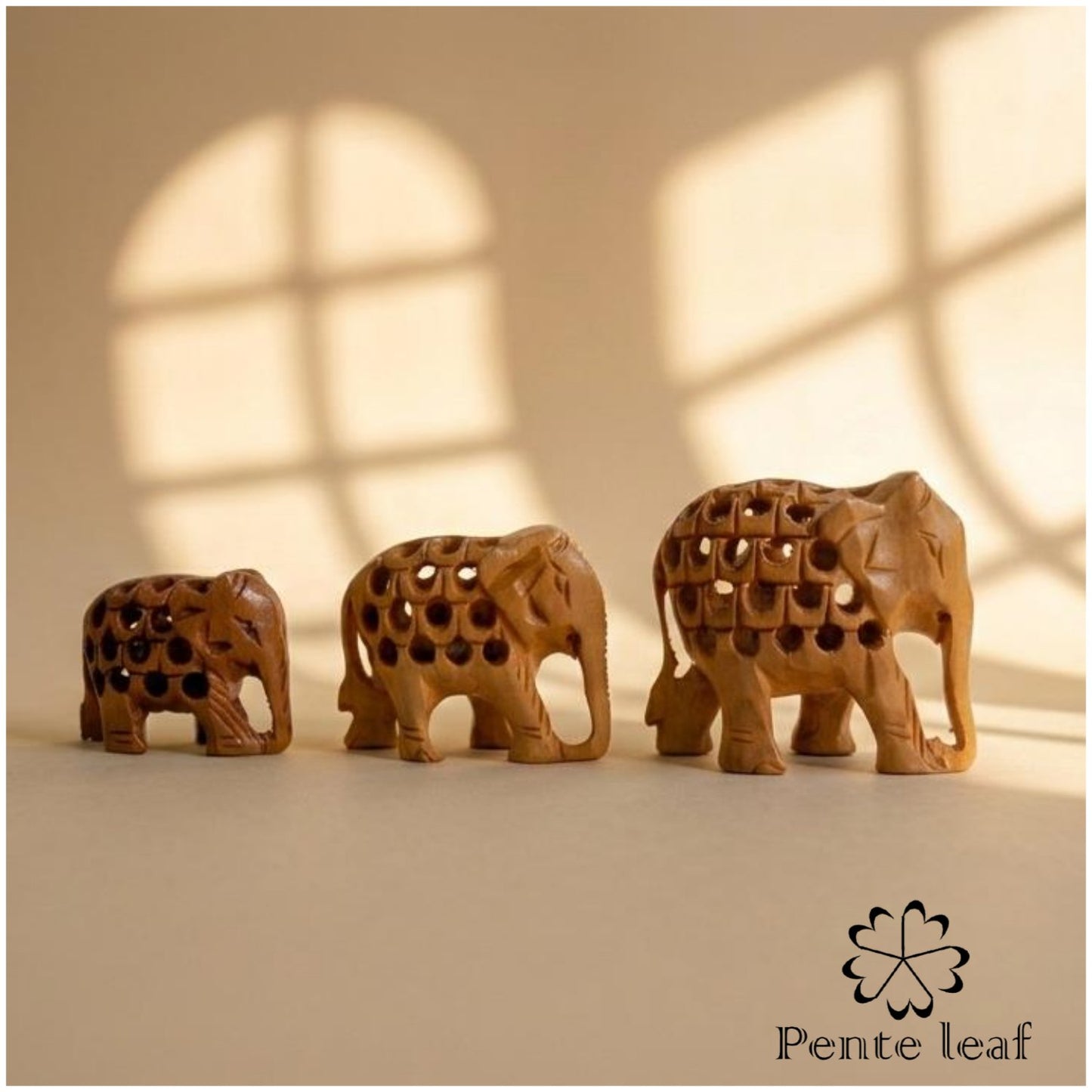 The Bodhi Quintet : Hand-carved Wooden Mini Elephant Family (trunk down) | Wooden Handicraft