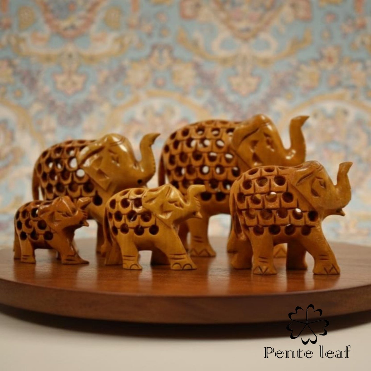 The Vatsalya Quintet : Hand-carved Wooden Elephant Family (trunk up) | Wooden Handicraft