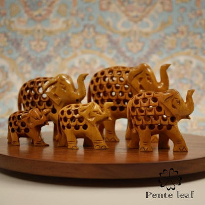 The Vatsalya Quintet : Hand-carved Wooden Elephant Family (trunk up) | Wooden Handicraft