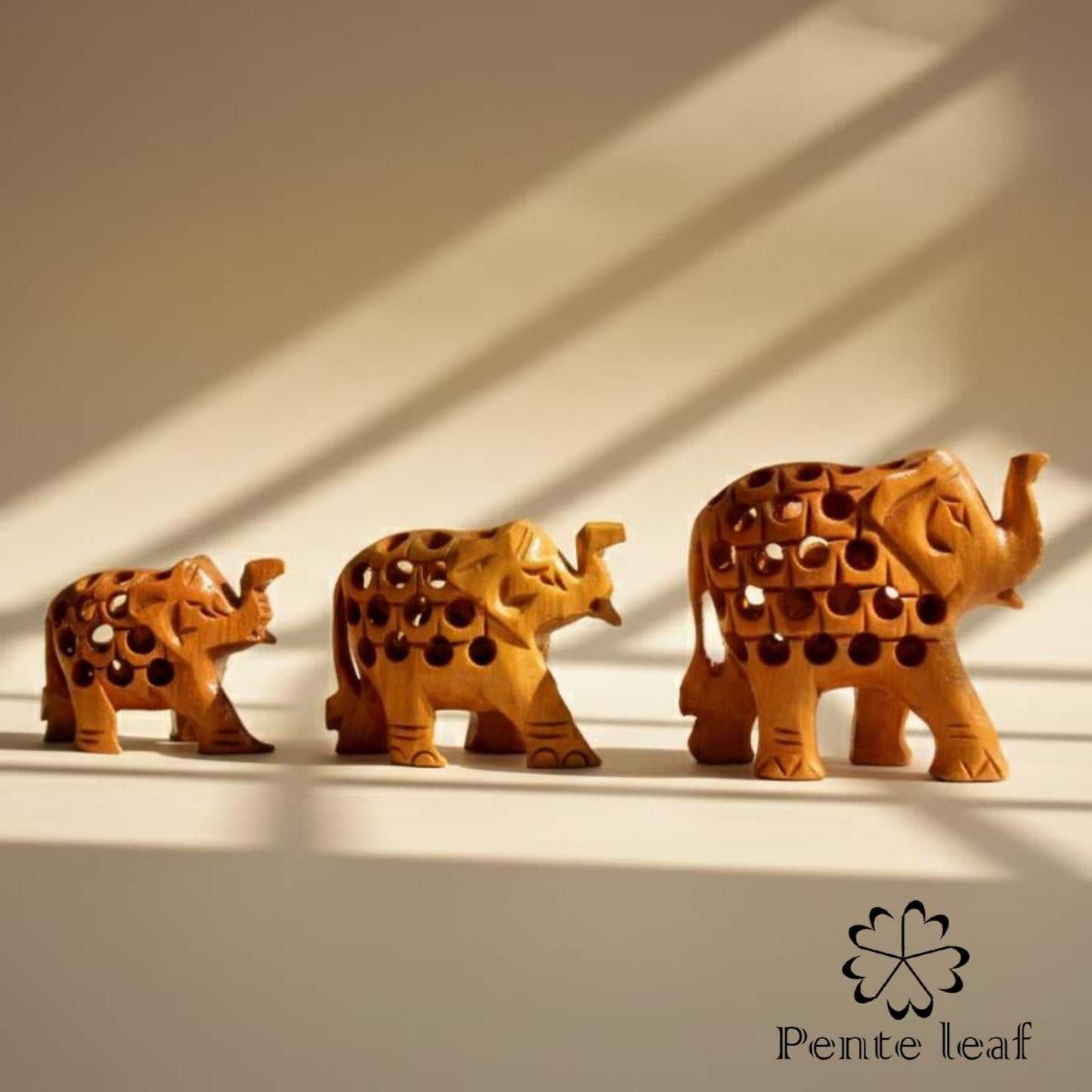 The Vatsalya Quintet : Hand-carved Wooden Elephant Family (trunk up) | Wooden Handicraft